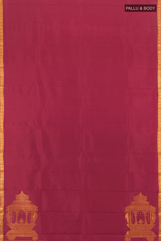 Flat view of Pure Silk Pure Zari Maroon Kanjivaram Saree with Zari Butta on the body and Silk Border. 