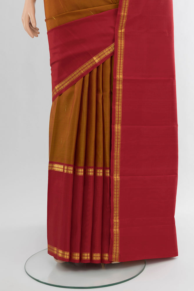 Pleats and pallu of Pure Silk Pure Zari Multi Color Kanjivaram Saree with Zari Butta on the body and Silk Border. 