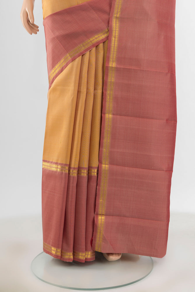 Pleats and pallu of Pure Silk Pure Zari Multi Color Kanjivaram Saree with Zari Butta on the body and Silk Border. 
