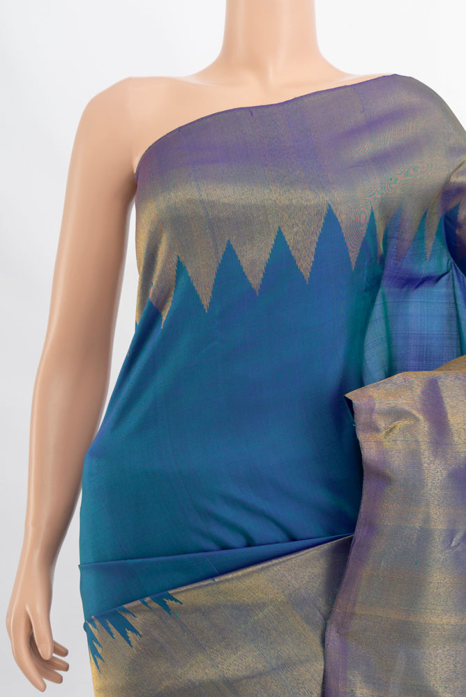 Border image of Pure Silk Pure Zari Peacock Blue Kanchipuram Saree with Zari Butta on the body and Silk Border. 