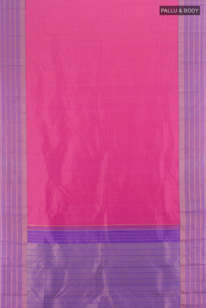 Flat view of Rose Gold Kanchipuram Silk Saree with Zari Butta on the body and Silk Border. 