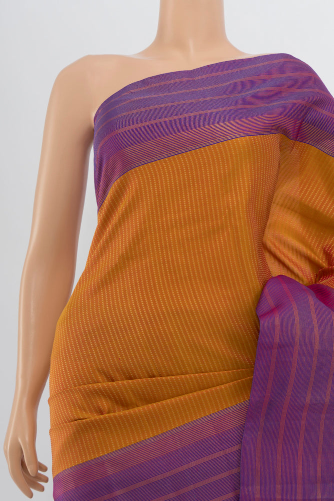 Border image of Rust Kanchipuram Silk Saree with Zari Butta on the body and Silk Border. 