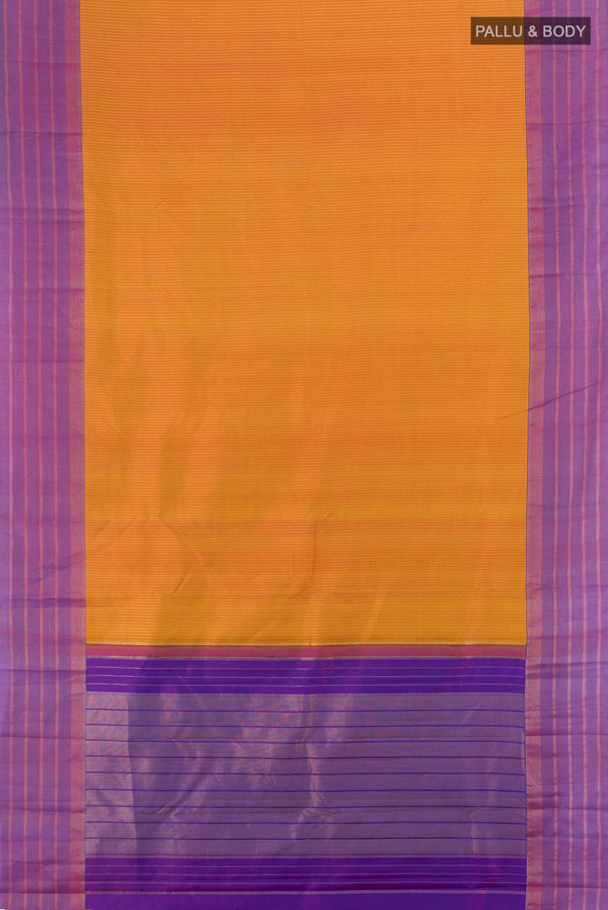 Flat view of Rust Kanchipuram Silk Saree with Zari Butta on the body and Silk Border. 