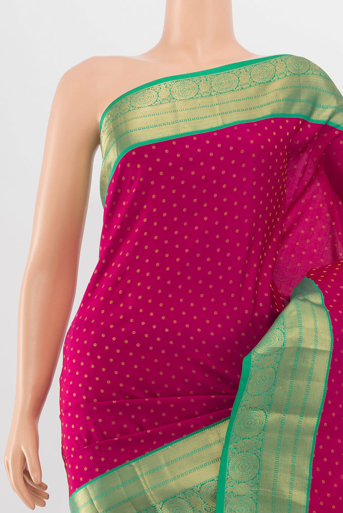 Border image of Dark Pink Kanchipuram Silk Saree with Zari Butta on the body and Silk Border. 