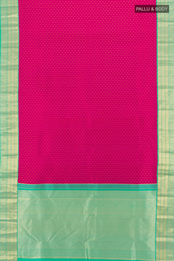 Flat view of Dark Pink Kanchipuram Silk Saree with Zari Butta on the body and Silk Border. 