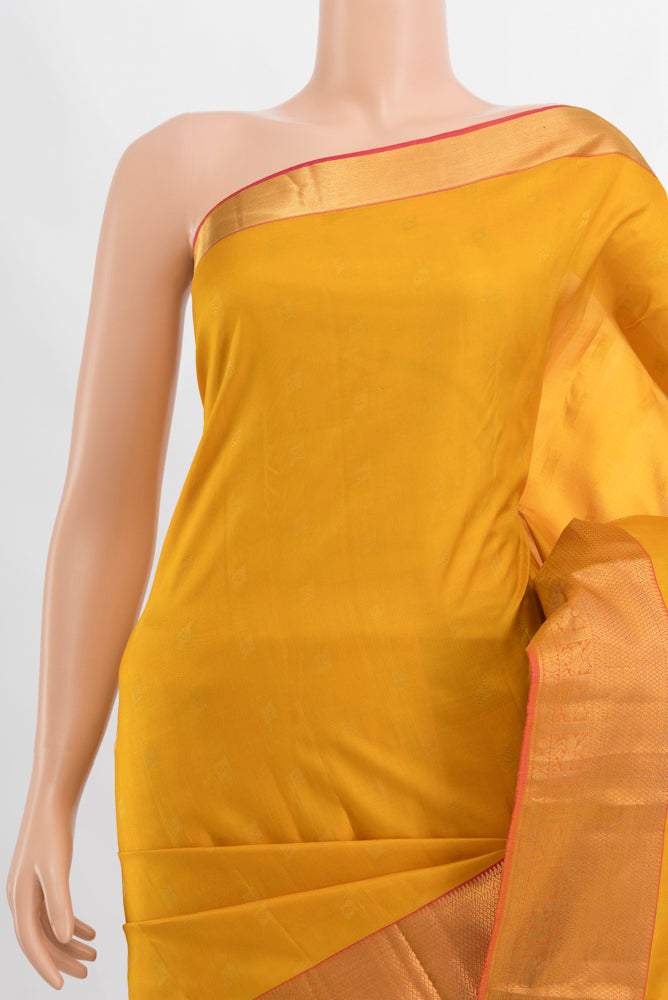 Border image of Mustard Kanchipuram Silk Saree with Zari Butta on the body and Silk Border. 