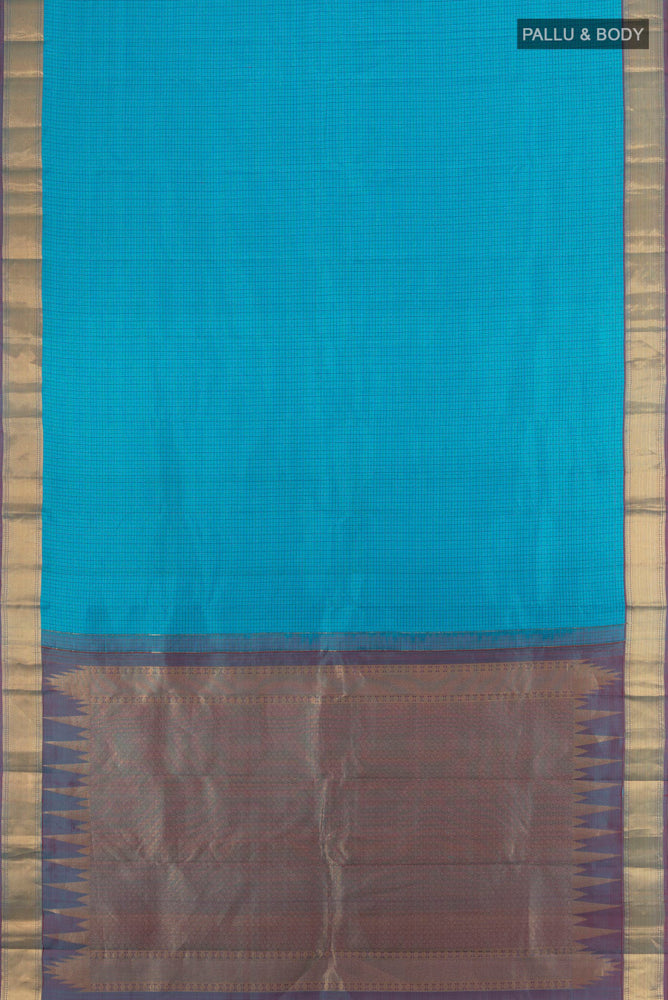 Flat view of Sky Blue Kanchipuram Silk Saree with Zari Butta on the body and Silk Border. 