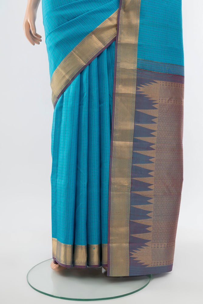 Pleats and pallu of Sky Blue Kanchipuram Silk Saree with Zari Butta on the body and Silk Border. 