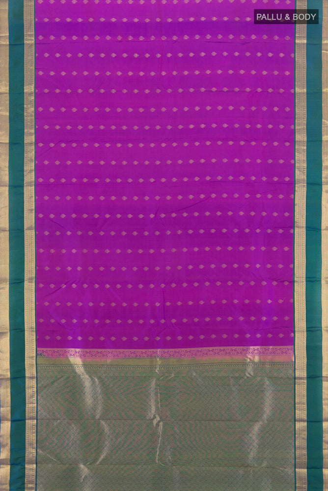 Flat view of Pure Silk Pure Zari Purple Kanchipuram Saree with Zari Butta on the body and Silk Border. 