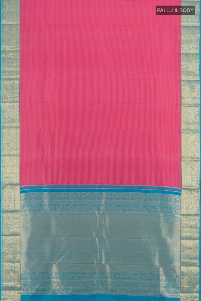 Flat view of Rose Gold Kanchipuram Silk Saree with Zari Butta on the body and Silk Border. 
