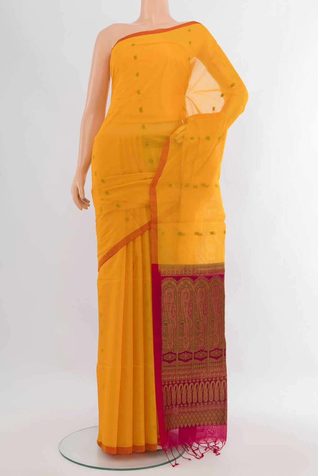Yellow Silk Cotton Saree with Thread Butta on the body and Without Border.  displayed on a mannequin