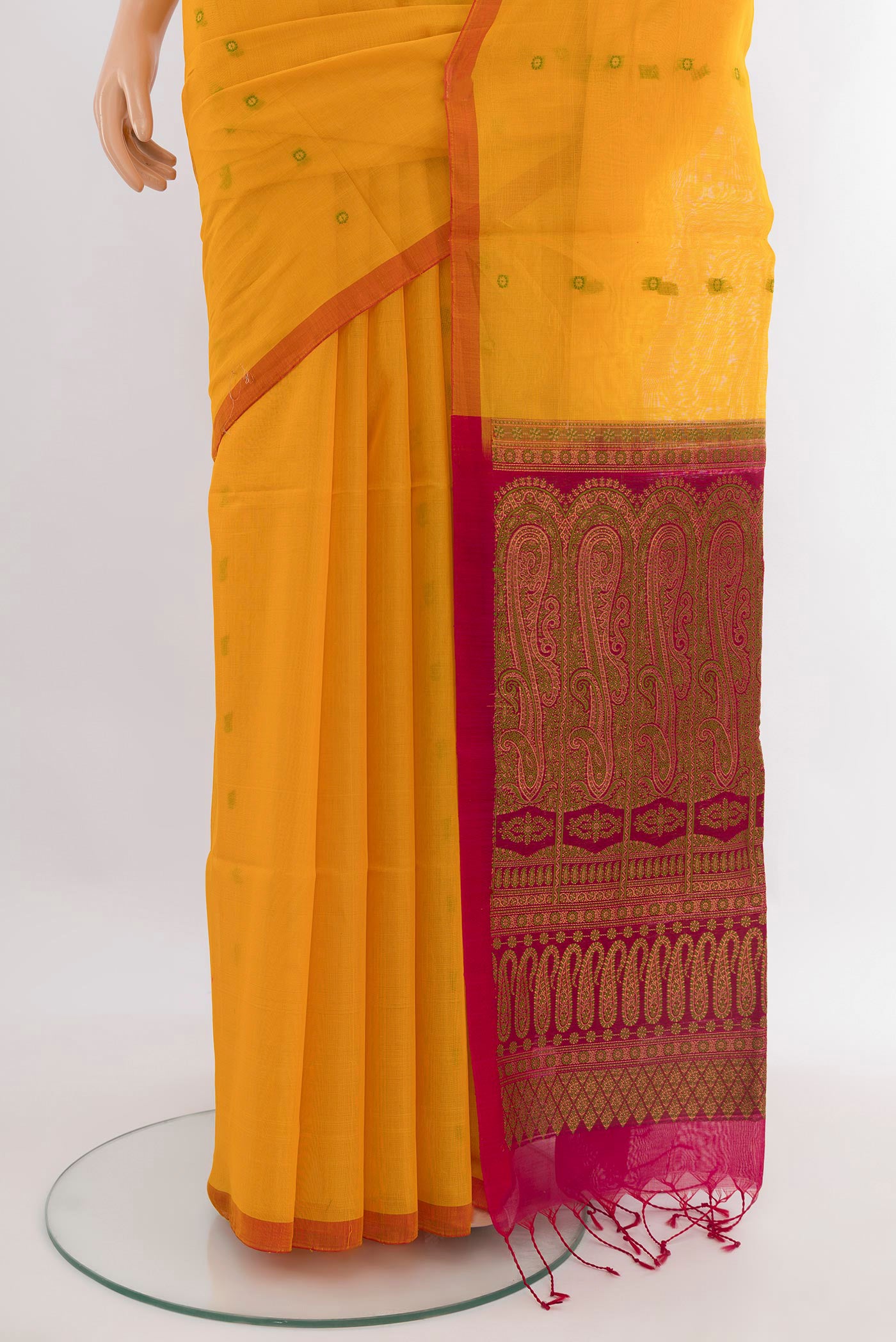 Pleats and pallu of Yellow Silk Cotton Saree with Thread Butta on the body and Without Border. 