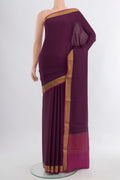 Coffee Brown Mysore Crepe Saree with Plain Body and Silk Border.  displayed on a mannequin