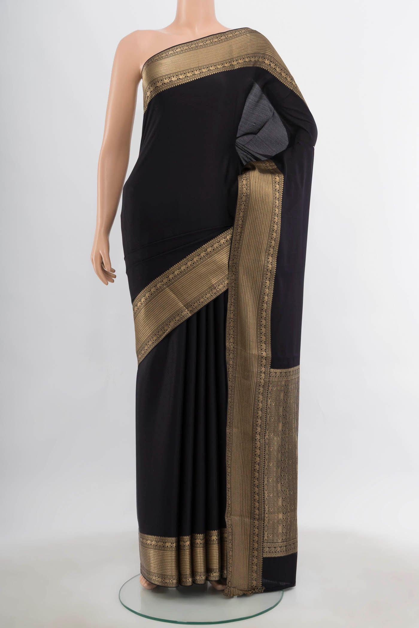 Black Mysore Crepe Saree with Zari Butta on the body and Silk Border.  displayed on a mannequin