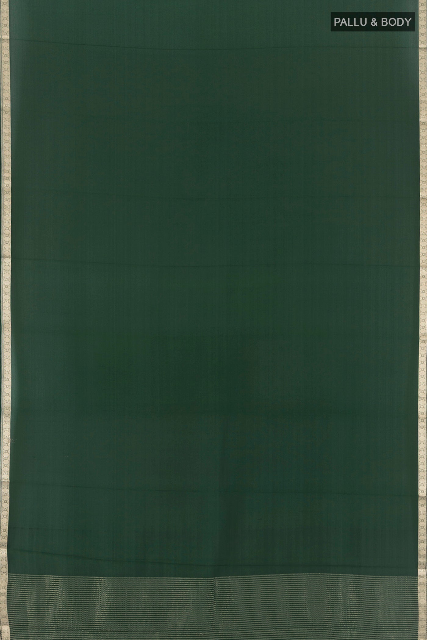 Flat view of Bottle Green Mysore Crepe Saree with Plain Body and Zari Border. 