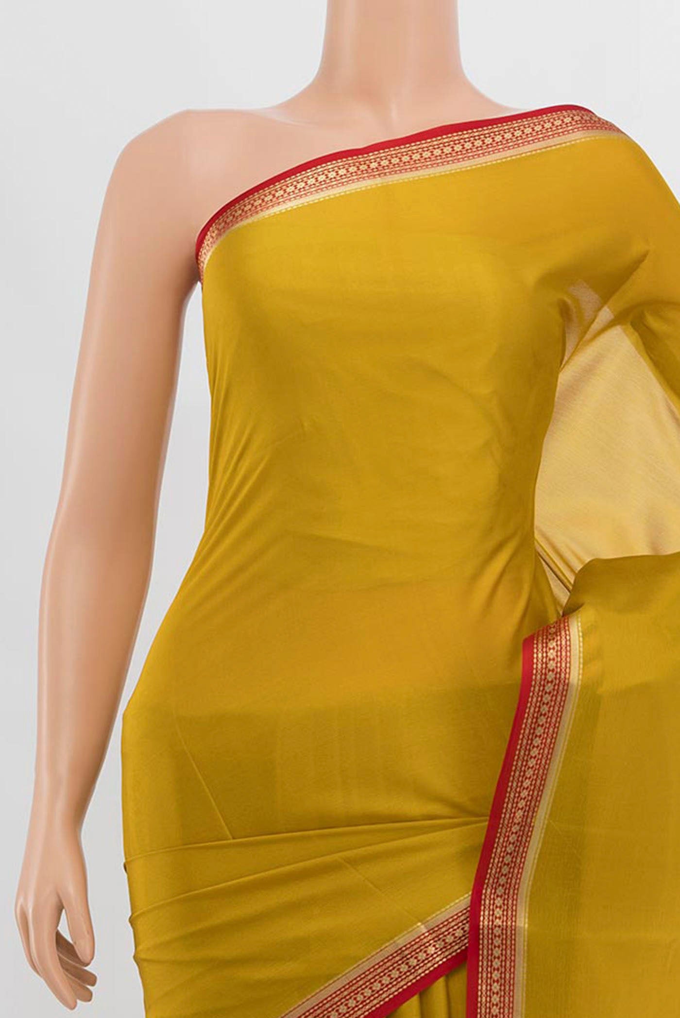 Border image of Yellow Mysore Crepe Saree with Zari Butta on the body and Silk Border. 