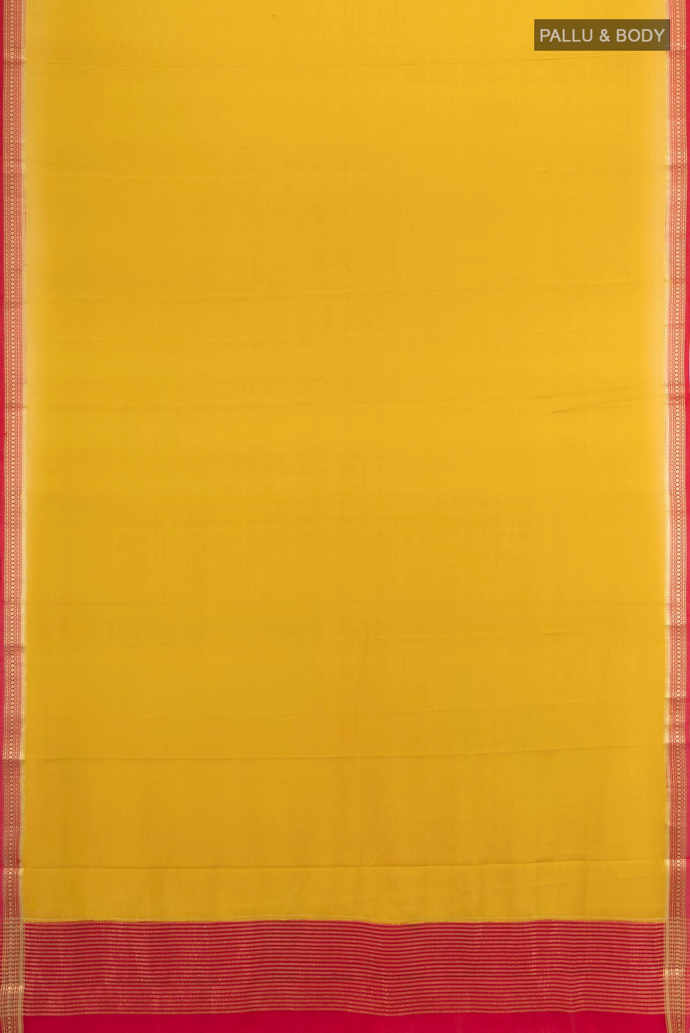 Flat view of Yellow Mysore Crepe Saree with Zari Butta on the body and Silk Border. 