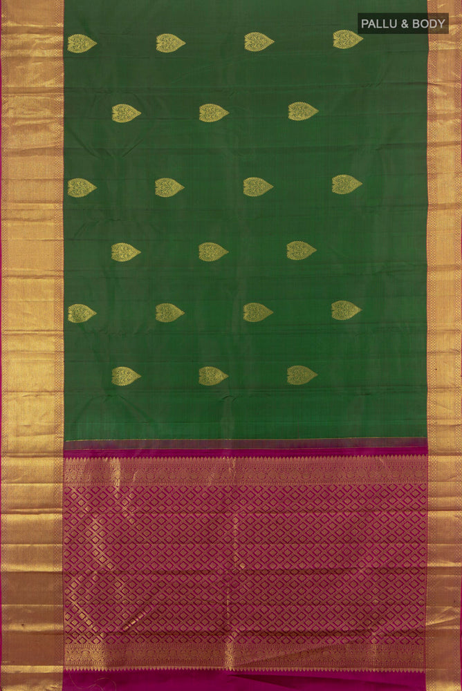Flat view of Bottle Green Kanchipuram Silk Saree with Zari Butta on the body and Silk Border. 
