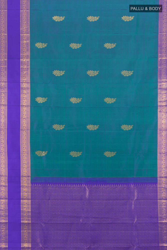 Flat view of Peacock Blue Kanchipuram Silk Saree with Plain Body and Silk Border. 