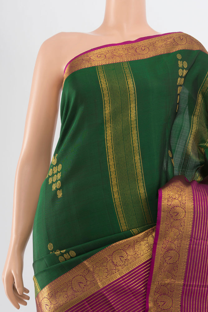 Border image of Pure Silk Pure Zari Bottle Green Kanchipuram Saree with Zari Butta on the body and Silk Border. 