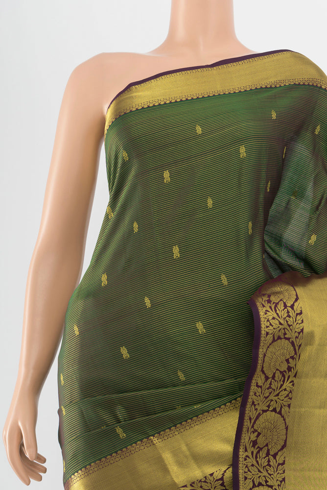 Border image of Pure Silk Pure Zari Green Kanchipuram Saree with Zari Butta on the body and Silk Border. 