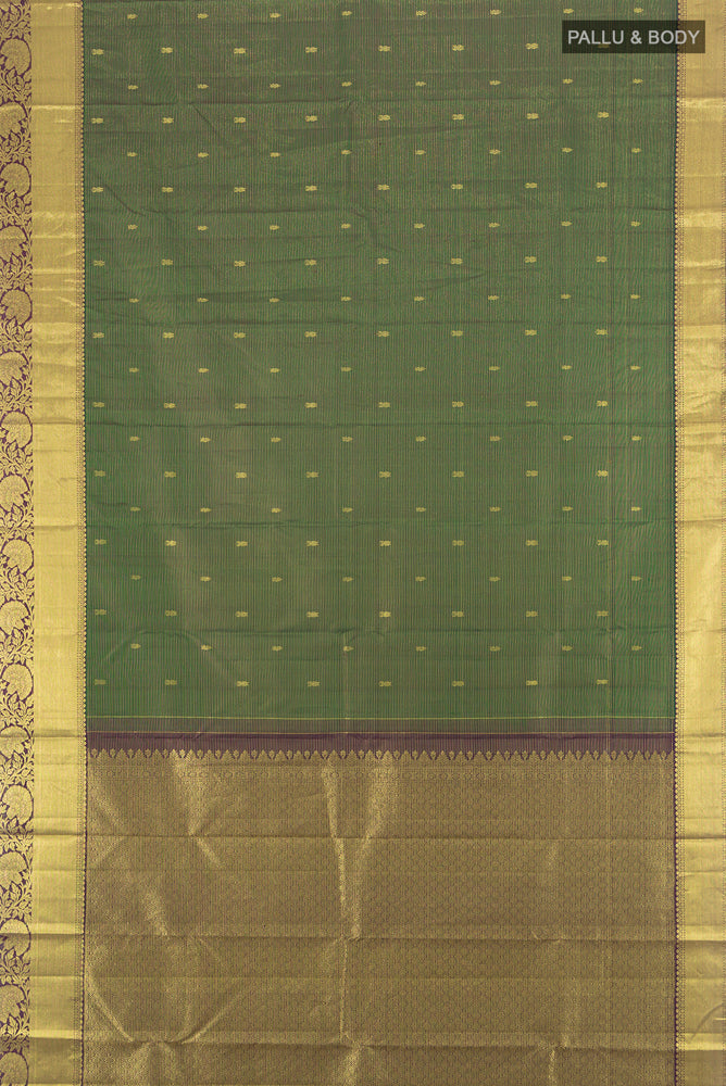 Flat view of Pure Silk Pure Zari Green Kanchipuram Saree with Zari Butta on the body and Silk Border. 