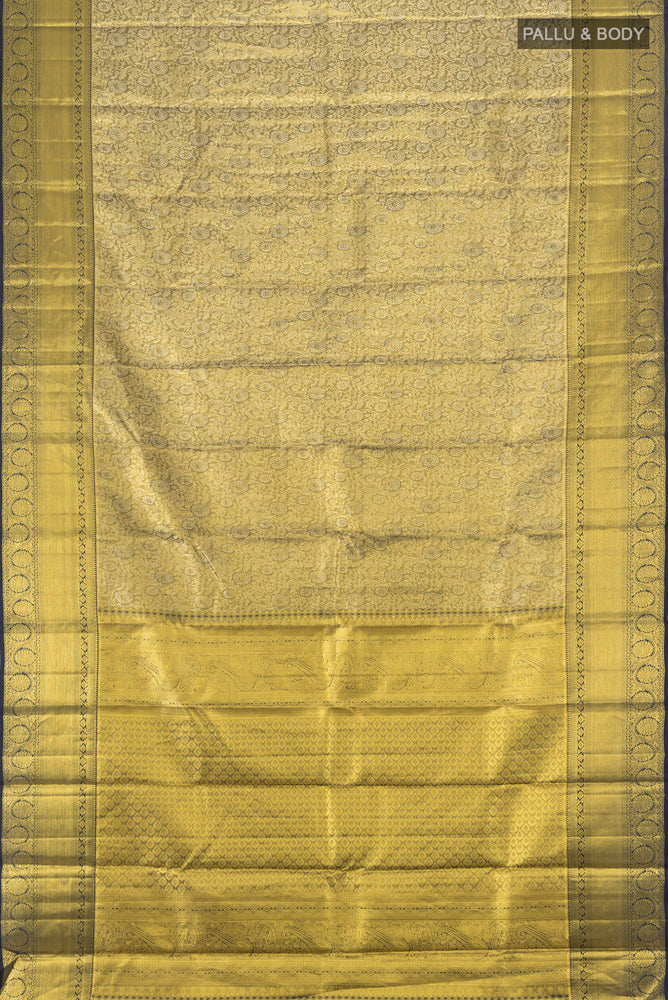 Flat view of Pure Silk Pure Zari Golden Kanchipuram Saree with Zari Butta on the body and Silk Border. 