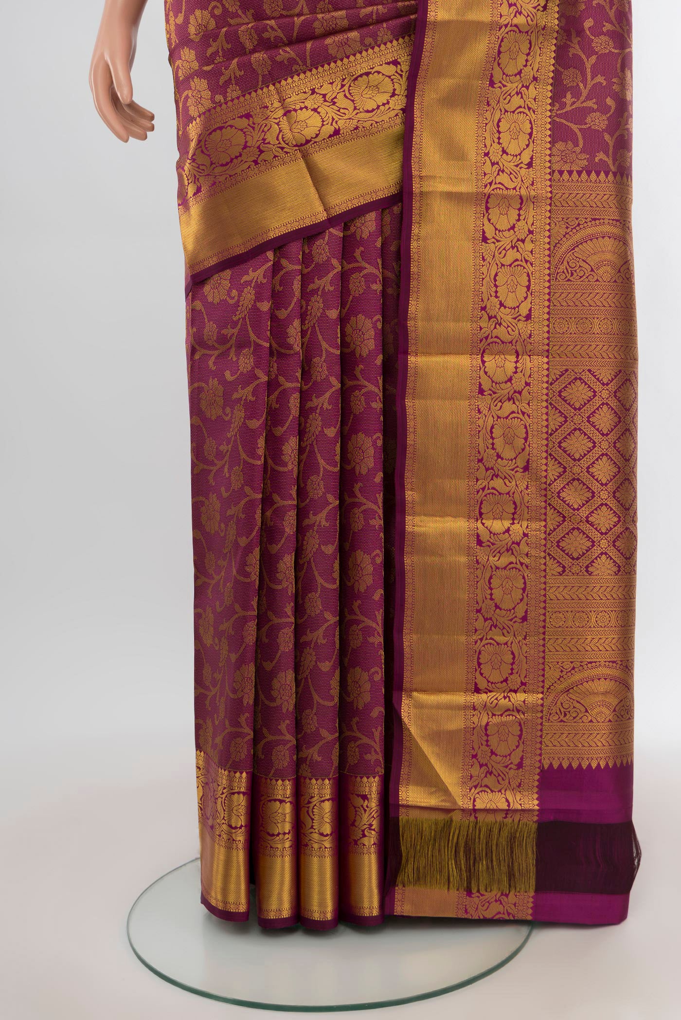 Pleats and pallu of Purple Kanjivaram Silk Saree with Zari Brocade on the body and Zari Border. 