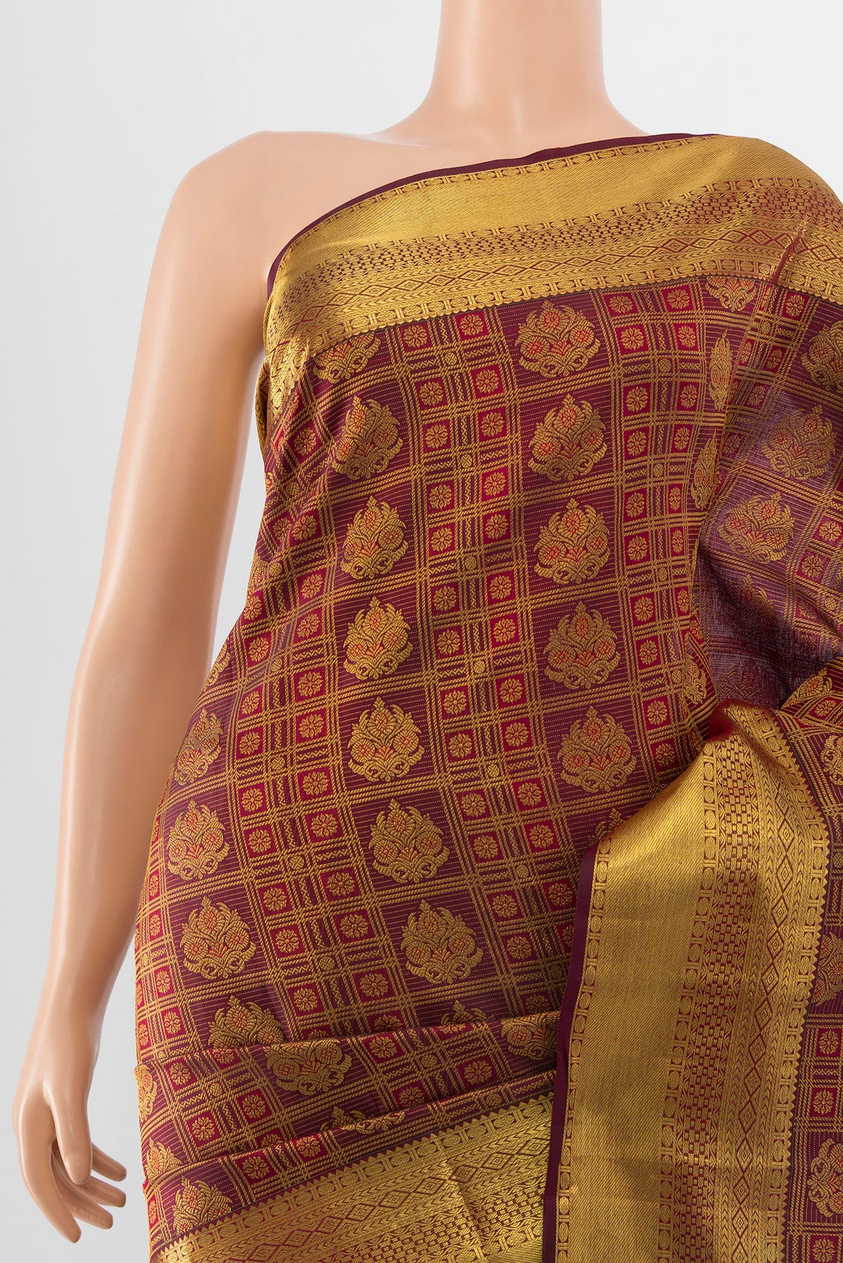 Border image of Pure Silk Pure Zari Maroon Kanjivaram Saree with Zari Butta on the body and Silk Border. 