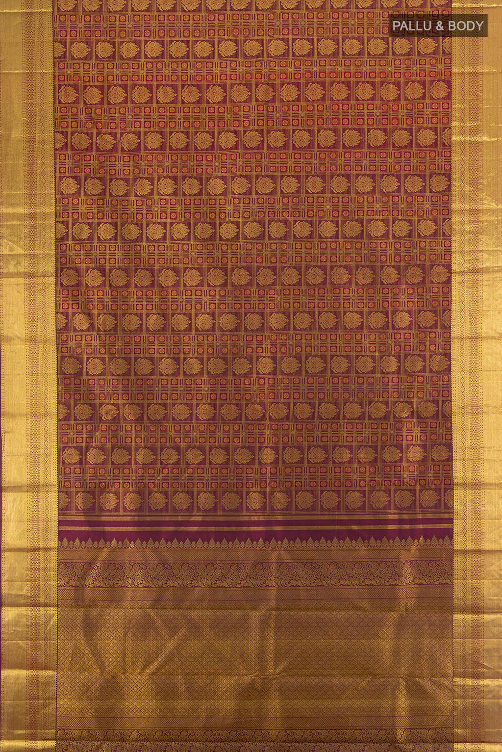 Flat view of Pure Silk Pure Zari Maroon Kanjivaram Saree with Zari Butta on the body and Silk Border. 