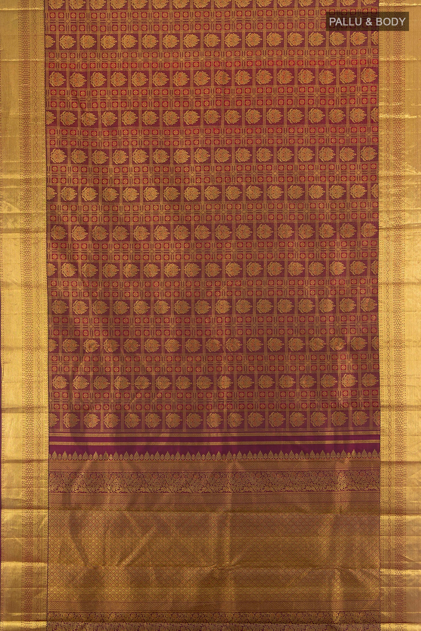 Flat view of Pure Silk Pure Zari Maroon Kanjivaram Saree with Zari Butta on the body and Silk Border. 