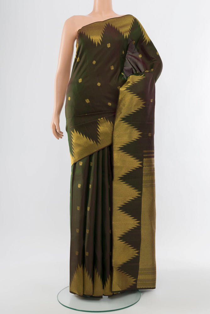 Mehandi Green Kanchipuram Silk Saree with Zari Butta on the body and Silk Border.  displayed on a mannequin