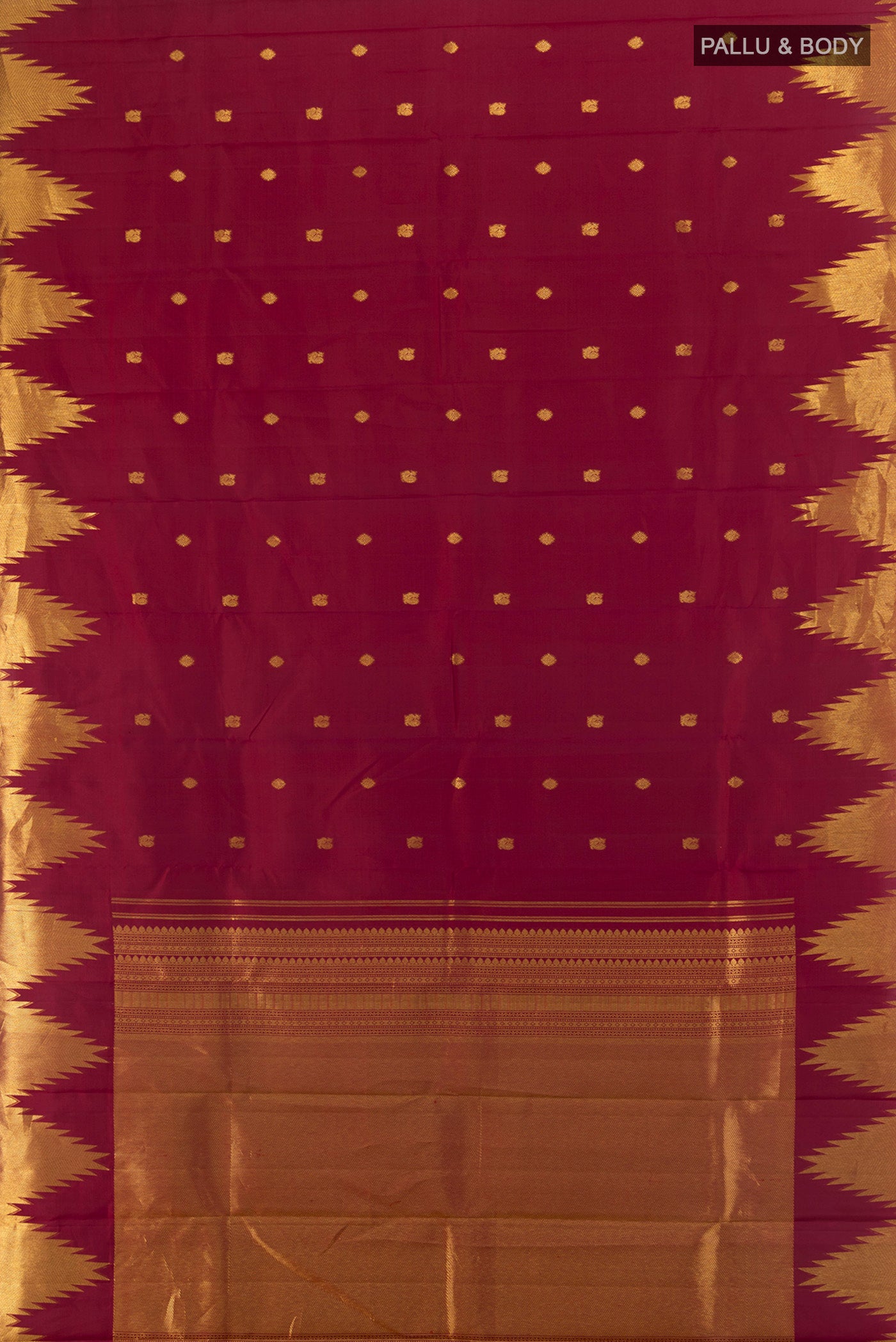 Flat view of Maroon Kanchipuram Silk Saree with Zari Butta on the body and Temple Border. 