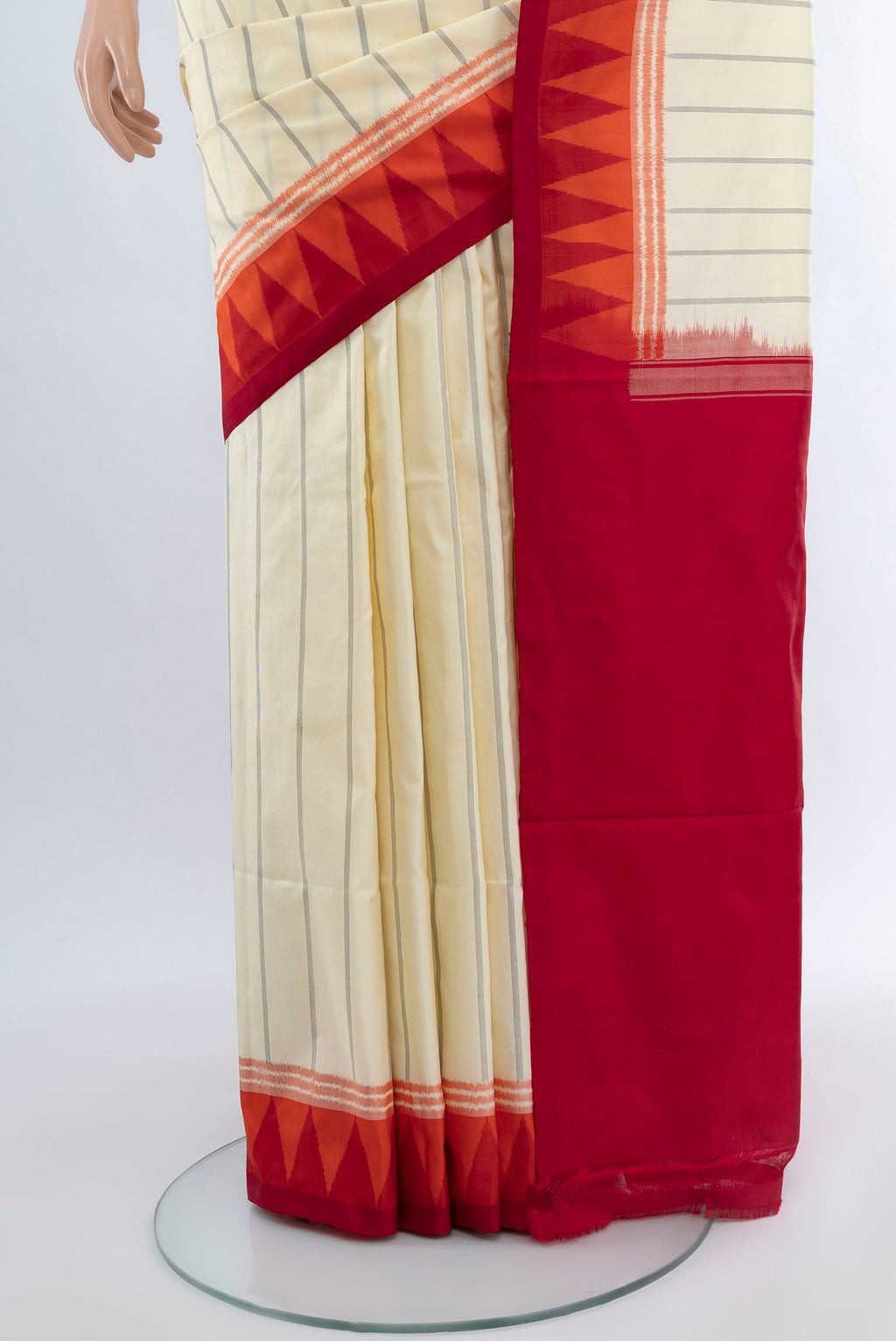 Pleats and pallu of Cream Pochampally Silk Saree with Ikat Print on the body and Silk Border. 