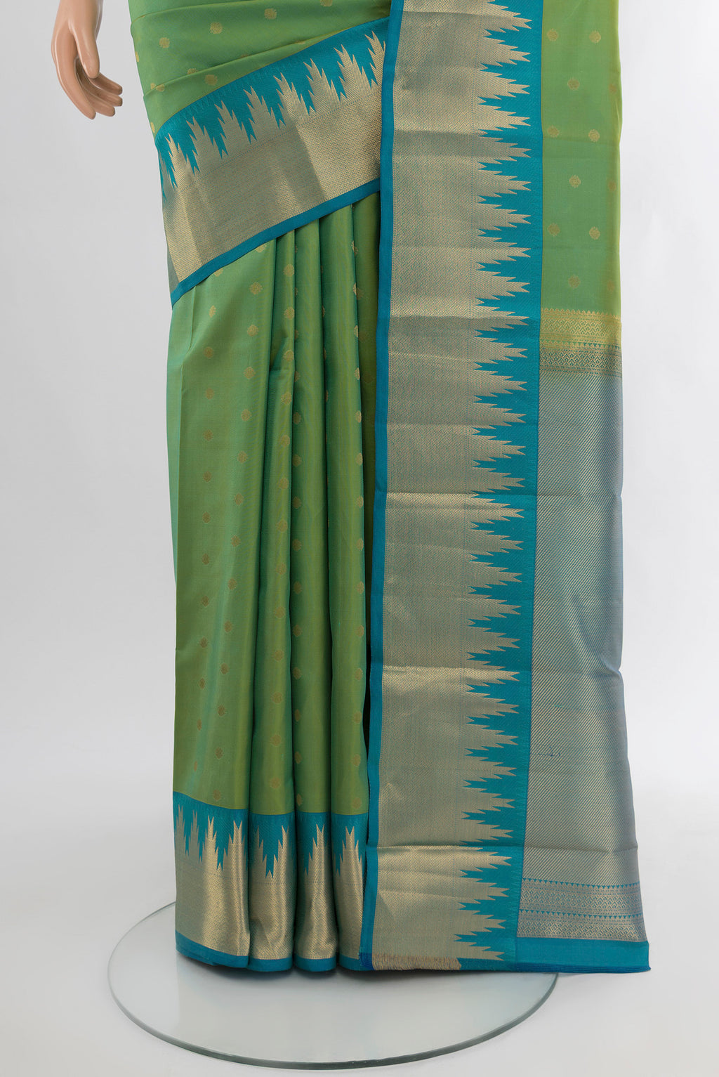 Pleats and pallu of Light Green Kanchipuram Silk Saree with Zari Butta on the body and Zari Border. 