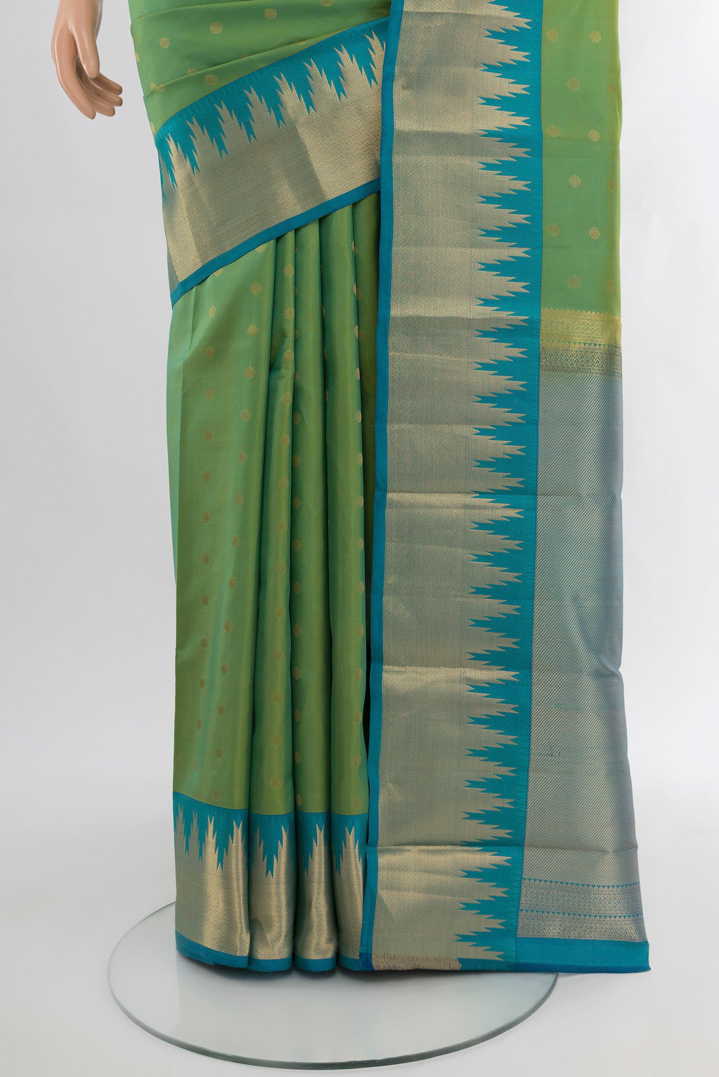 Pleats and pallu of Light Green Kanchipuram Silk Saree with Zari Butta on the body and Zari Border. 