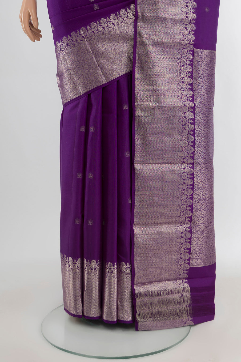 Pleats and pallu of Violet Kanchipuram Silk Saree with Zari Butta on the body and Zari Border. 