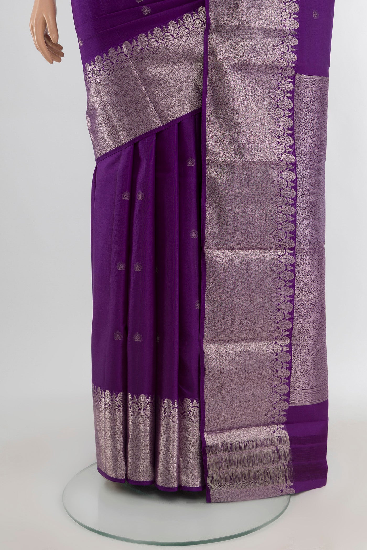 Pleats and pallu of Violet Kanchipuram Silk Saree with Zari Butta on the body and Zari Border. 