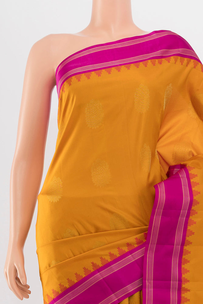 Border image of Mustard Kanchipuram Silk Saree with Zari Butta on the body and Silk Border. 