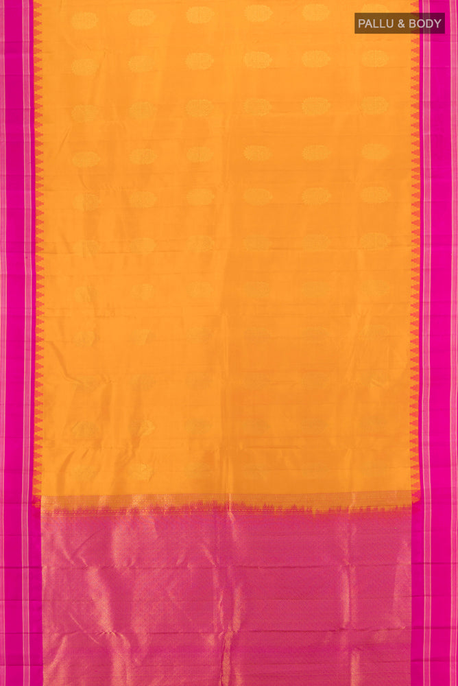 Flat view of Mustard Kanchipuram Silk Saree with Zari Butta on the body and Silk Border. 