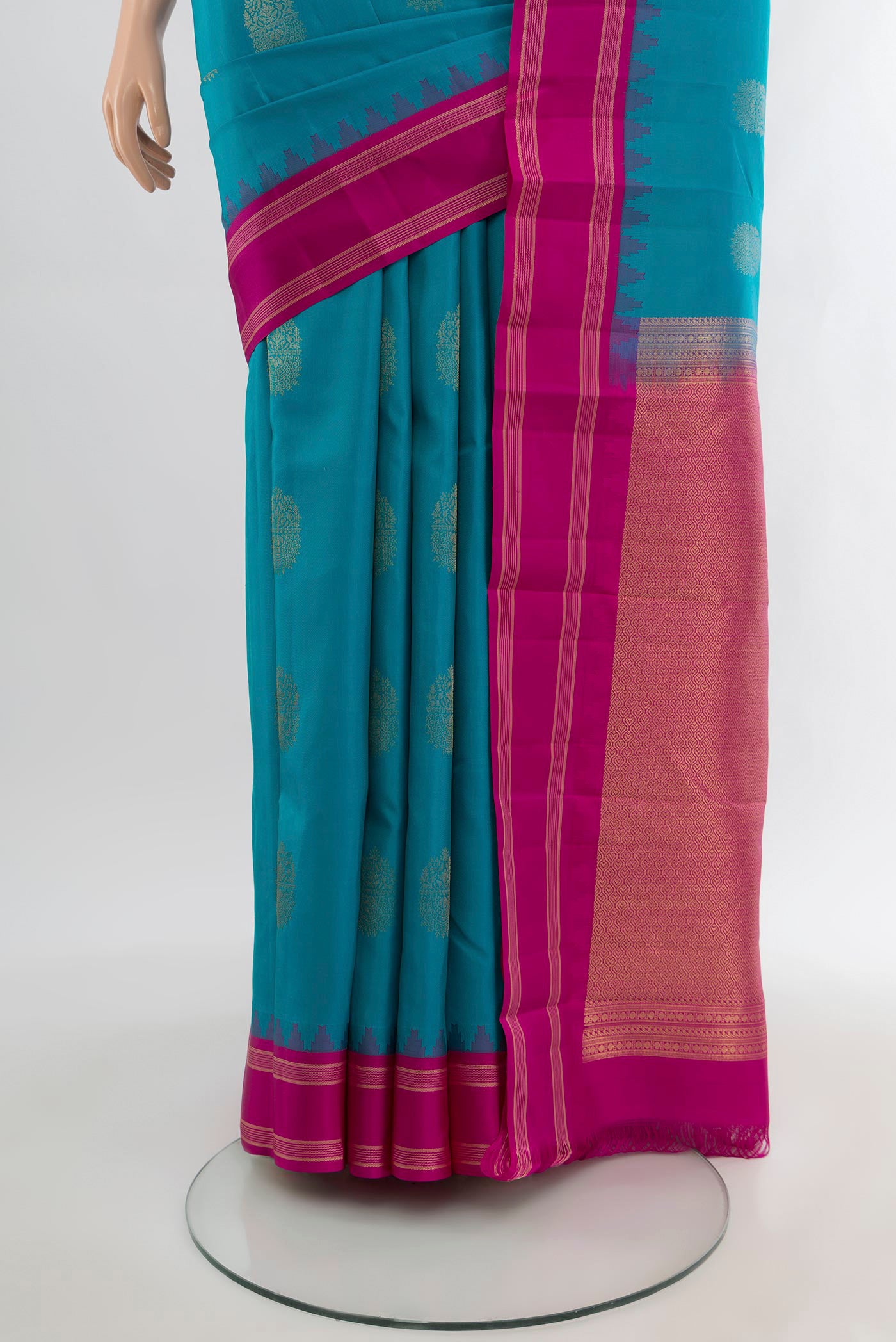 Pleats and pallu of Blue Kanchipuram Silk Saree with Zari Butta on the body and Zari Border. 