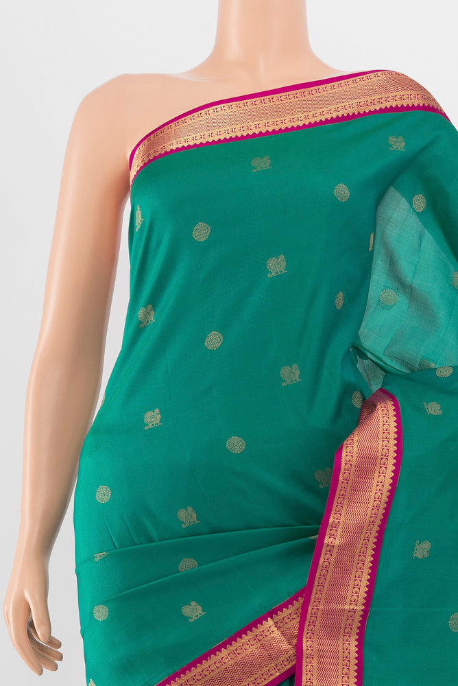 Border image of Peacock Blue Kanchipuram Silk Saree with Zari Butta on the body and Silk Border. 