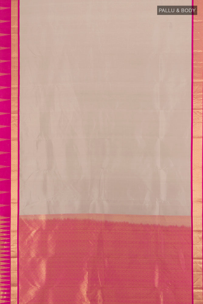 Flat view of Teal Kanjivaram Silk Saree with Zari Butta on the body and Silk Border. 