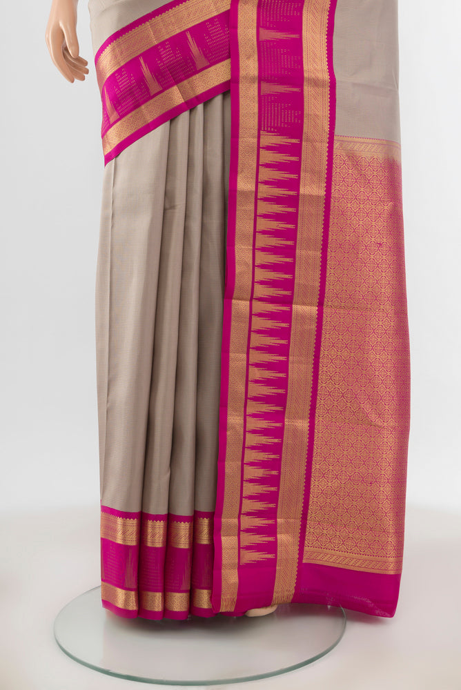 Pleats and pallu of Teal Kanjivaram Silk Saree with Zari Butta on the body and Silk Border. 