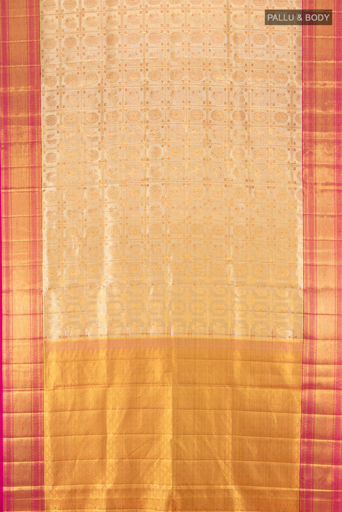 Flat view of Golden Kanjivaram Silk Saree with Zari Butta on the body and Silk Border. 
