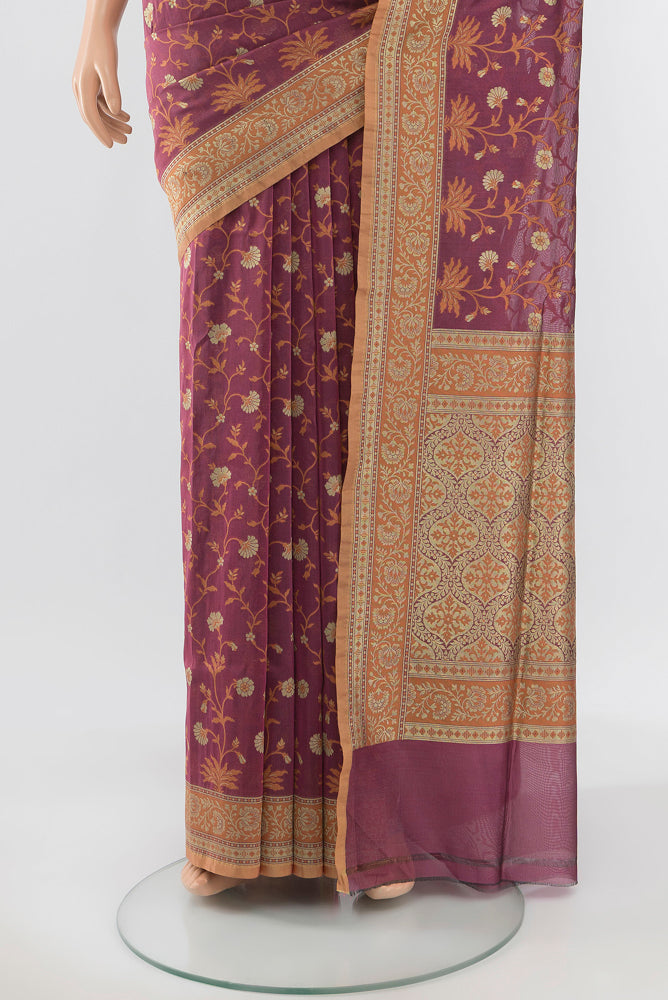 Pleats and pallu of Pure Silk Pure Zari Bronze Banarasi Georgette Saree with Zari Butta on the body and Silk Border. 