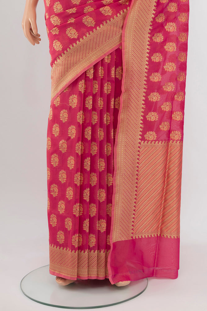 Pleats and pallu of Peach Banarasi Georgette Saree with Zari Brocade on the body and Silk Border. 