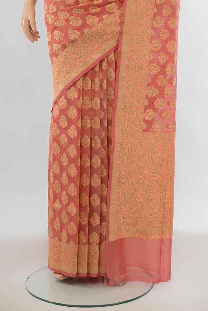 Pleats and pallu of Peach Banarasi Silk Saree with Zari Butta on the body and Silk Border. 