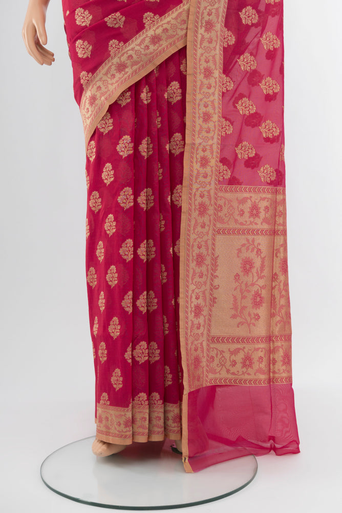Pleats and pallu of Peach Banarasi Georgette Saree with Zari Brocade on the body and Silk Border. 