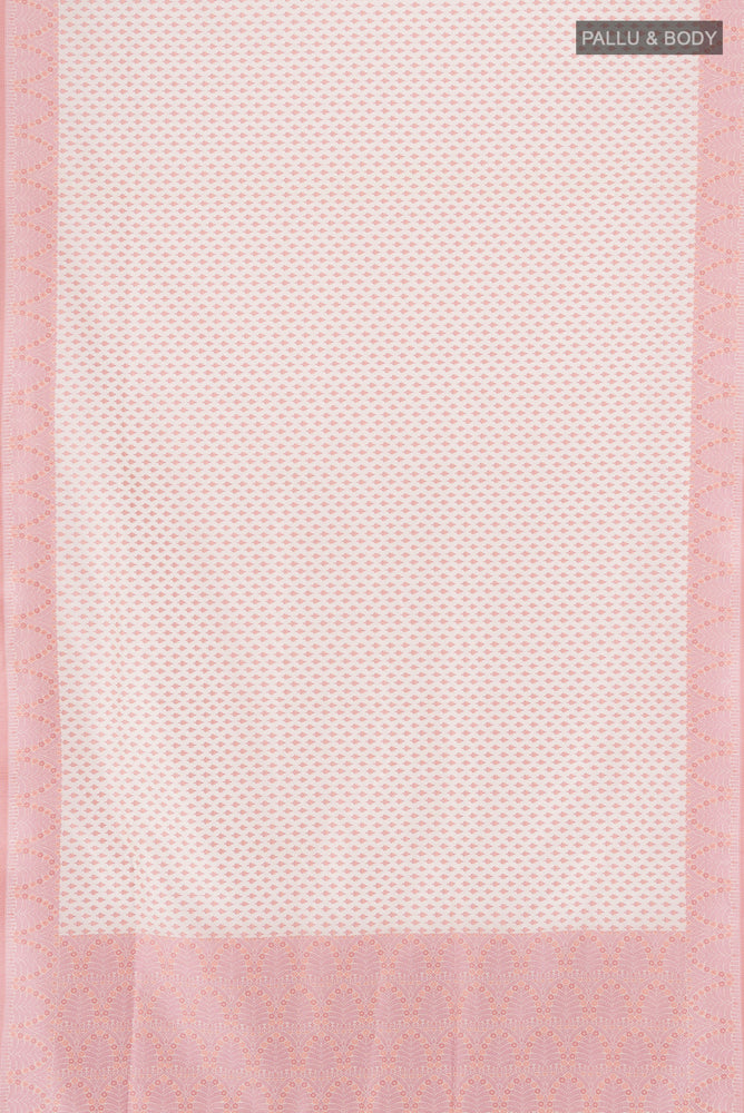 Flat view of Cream Banarasi Silk Saree with Zari Butta on the body and Silk Border. 